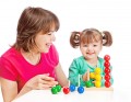 Mom plays with her daughter