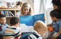 Teacher and students reading a Christmas story together