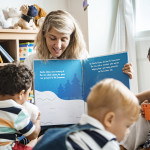 Teacher and students reading a Christmas story together