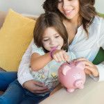 Mom and daughter saving money